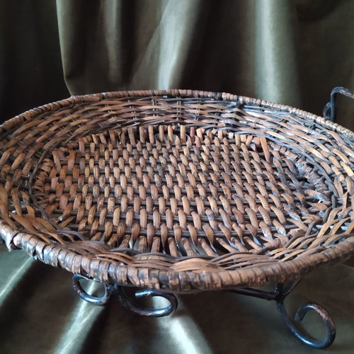 Woven rattan tray used with metal frame