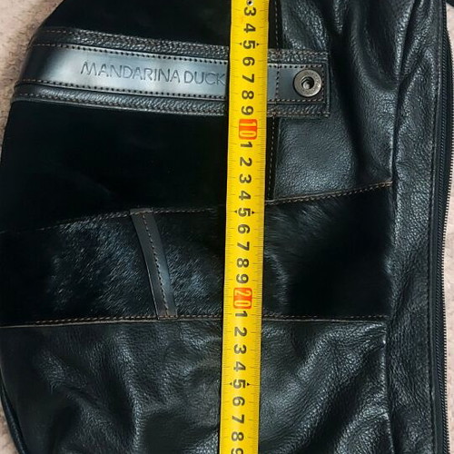 Mandarina Duck leather bag black like new with castor and pony skin