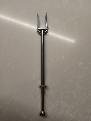 Vintage stainless steel serving fork with spring for olives pickles sweets like new