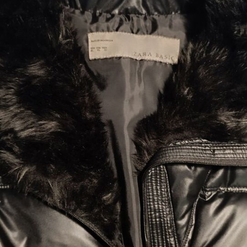 Women's sleeveless black jacket with fur collar and belt like new