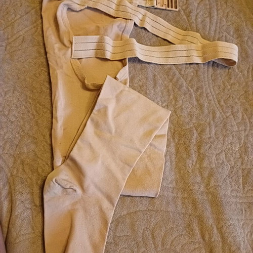 Compression sock used for left foot with strap