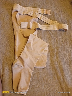 Compression sock used for left foot with strap