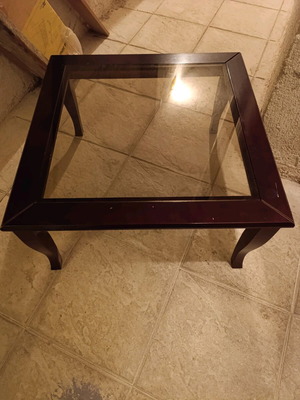 Various small furniture used, including low table with smoked glass and five chairs