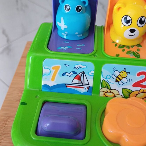 Interactive baby toy suitcase with animal sounds and pop-up features