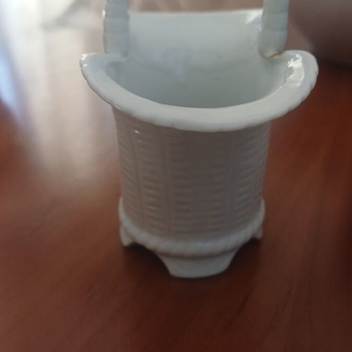 Porcelain decorative item used with a broken handle