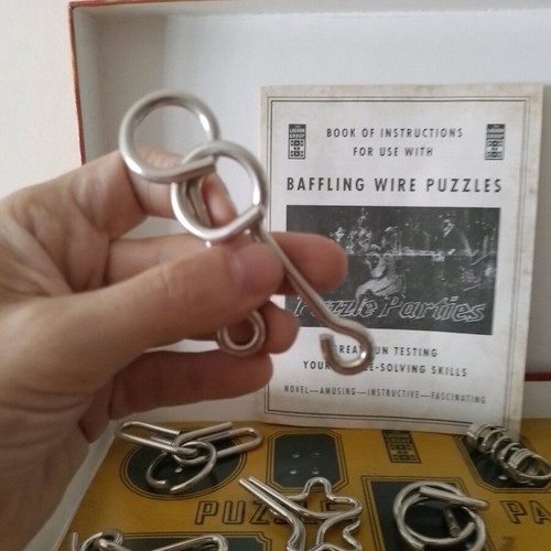 Retro wire puzzles game, 9 pieces with instructions, 3 missing