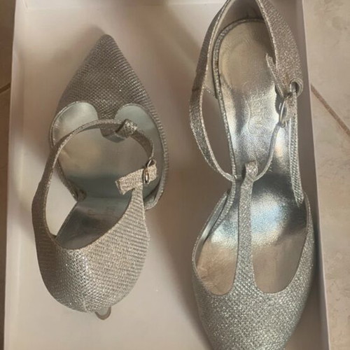 Silver pumps like new with ankle strap and thin heel, size 37