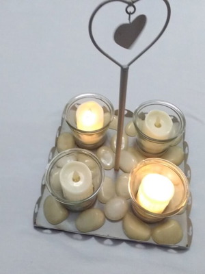 Decorative tray used with phosphorescent stones and electric candles