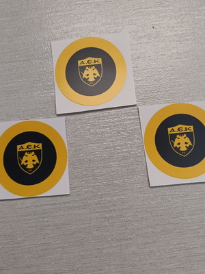 Αυτοκόλλητα της ΑΕΚ καινούργια, πακέτο 15 τεμαχίων, 5 εκ διάμετρο