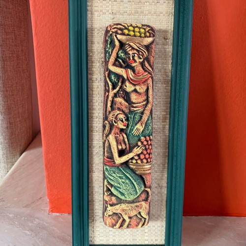 Handmade wooden frames with embossed exotic figures from Bali