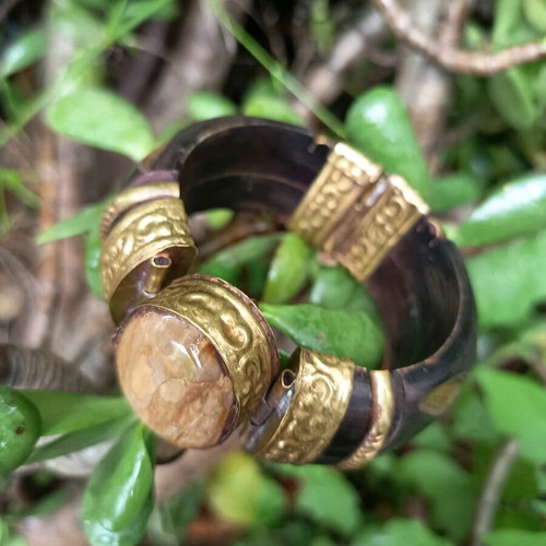 Wooden Boho bracelet used with bronze details and semi-precious stone