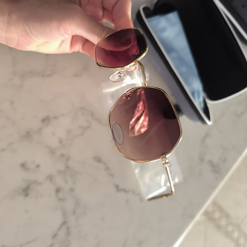 Sunglasses with brown lenses and gold frame, new with UV protection