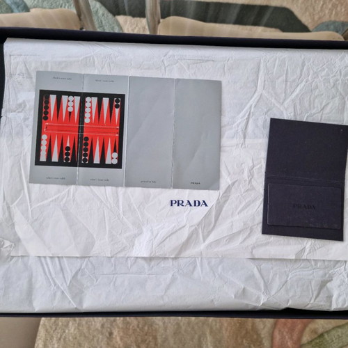 PRADA BOARD MADE OF GENUINE SAFFIANO LEATHER IN BLACK COLOR DATED 1999-2002 APPROX.