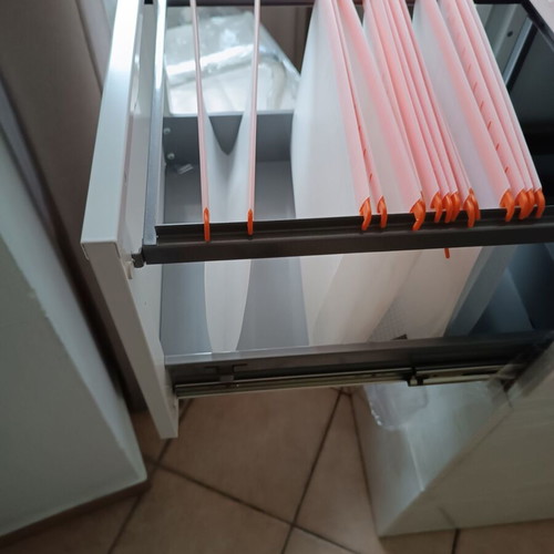 Metal filing cabinet with hanging folders and lock used