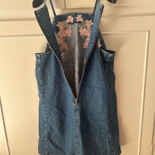 Attrattivo denim dress used with embroidered flowers and pockets