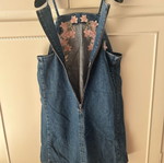 Attrattivo denim dress used with embroidered flowers and pockets