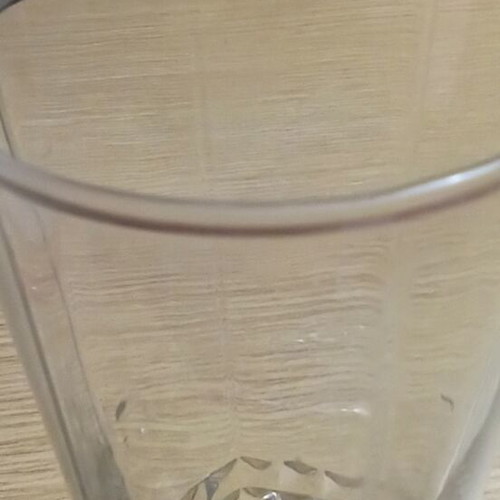 Water glass used, with DNA Aris, Elenas, Steliou