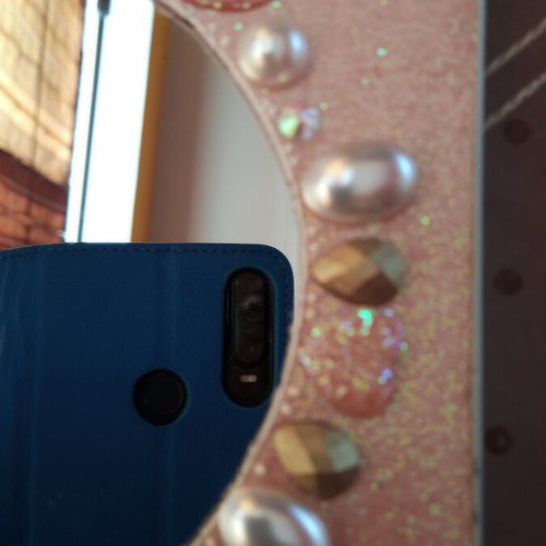 Handmade mirror with glitter and beads