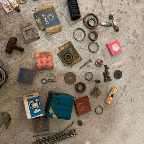 Various old chainsaw and small engine parts used