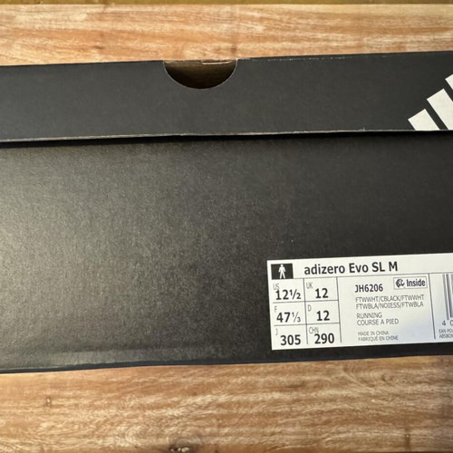Adidas Adizero Evo SL running shoes new with tags, size 47