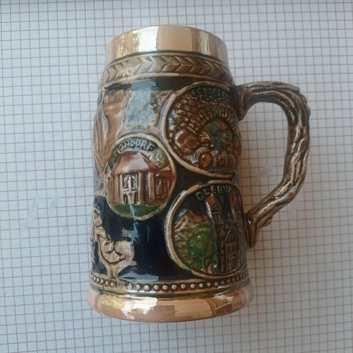Vintage ceramic beer mug with embossed Luxembourg scenes, like new