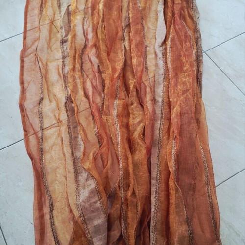 Organza curtain in earthy orange tones
