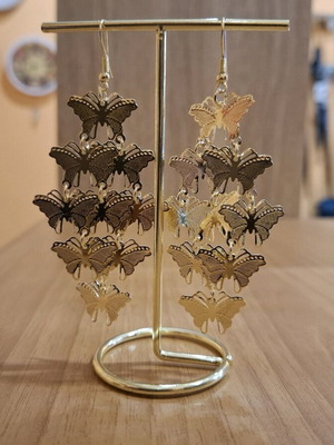 Handmade gold-colored dangling earrings new, 9 centimeters