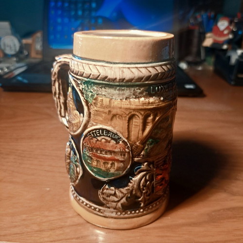 Vintage ceramic beer mug with embossed Luxembourg scenes, like new