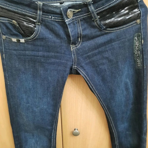 Jeans pants with black sequins on pockets, size S