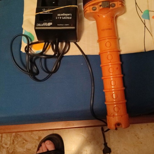 Flashlight like new with rechargeable batteries and charger