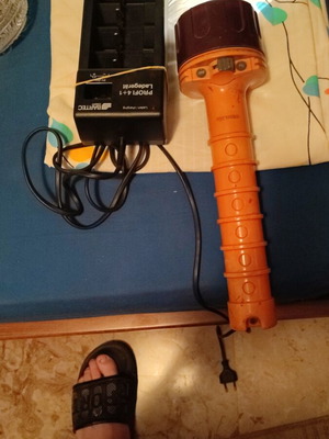 Flashlight like new with rechargeable batteries and charger
