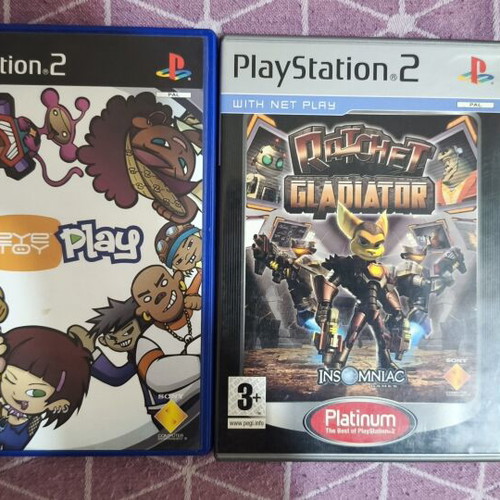 PlayStation 2 (PS2) used with 10 games and memory card