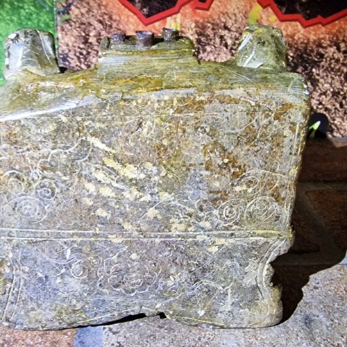 Antique carved stone decoration of Asian temple used