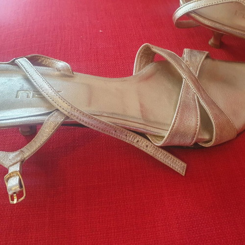 Nak gold sandals with low heel, used condition