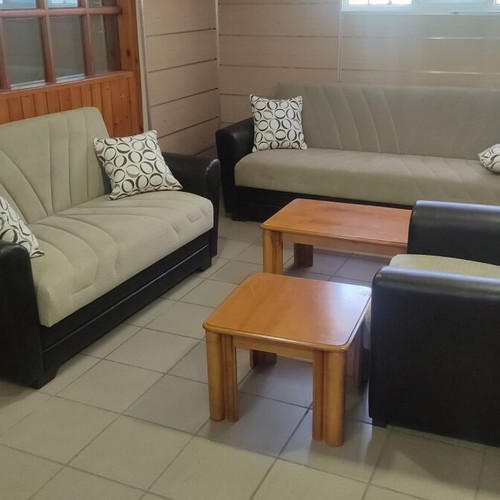 Living room set 6 pieces leather and fabric like new with storage and sofa bed