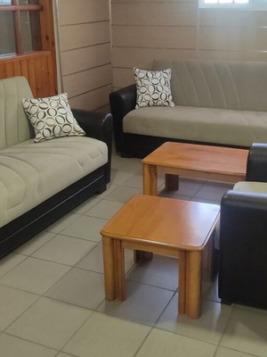 Living room set 6 pieces leather and fabric like new with storage and sofa bed