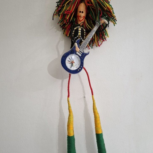 Vintage Table Clock Rastaman Figurine with Guitar like new
