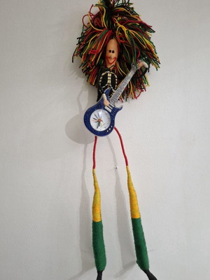 Vintage Table Clock Rastaman Figurine with Guitar like new