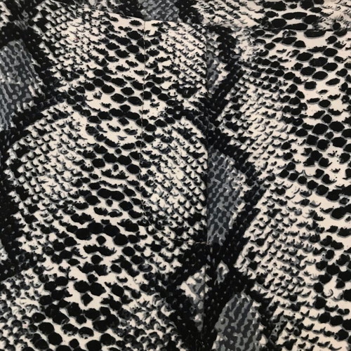 Black and white pants with snake pattern used