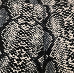 Black and white pants with snake pattern used