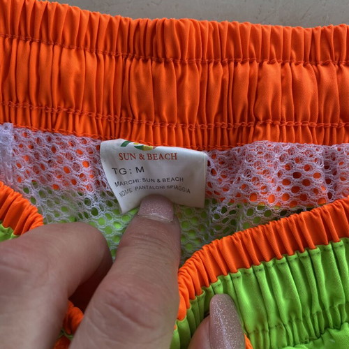 Men's swim shorts like new, fluorescent green with orange details