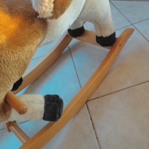 Wooden rocking horse like new with plush carriage