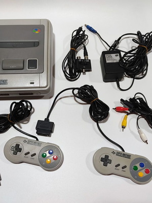 Super Nintendo Console (SNES) used with 3 games and cables