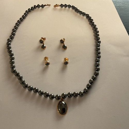 Hematite necklace and earrings set with 14k gold and sapphire like new