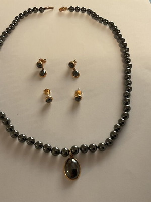 Hematite necklace and earrings set with 14k gold and sapphire like new