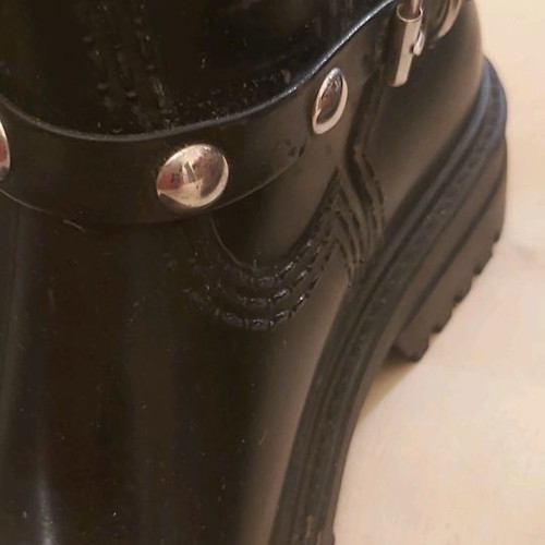 Women's galotses used size 37 durable plastic with cotton lining and removable studded strap