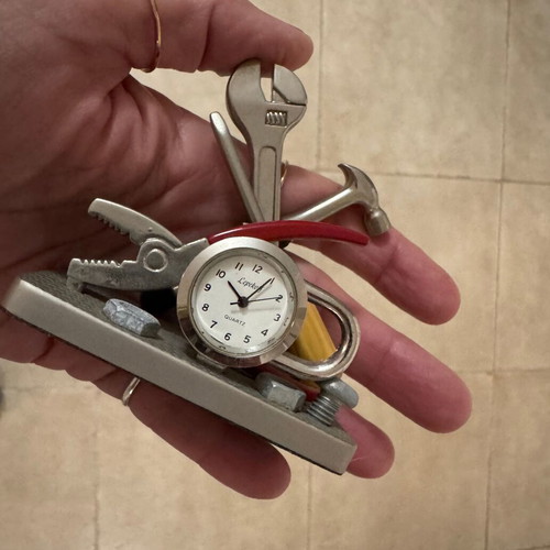 Decorative tabletop clock like new with tools theme