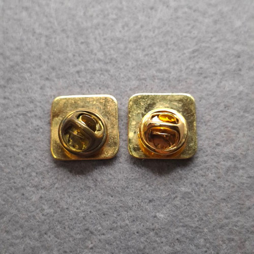 Set of 2 vintage pins with gold dancer figures on blue enamel like new