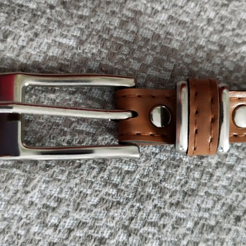 Women's belt used tan with silver buckle