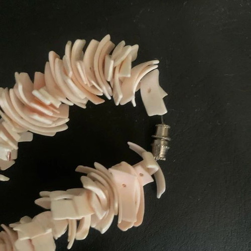 Shell necklace in pink and beige colors like new